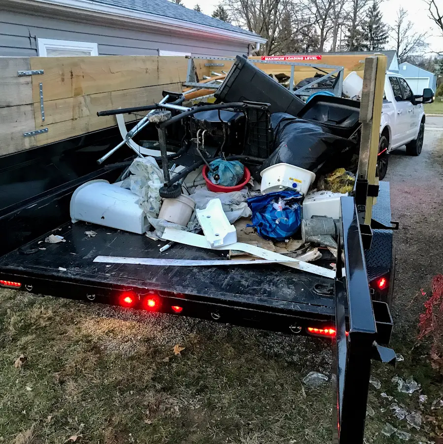 Roll-off dumpster delivered to a residential driveway in Selma